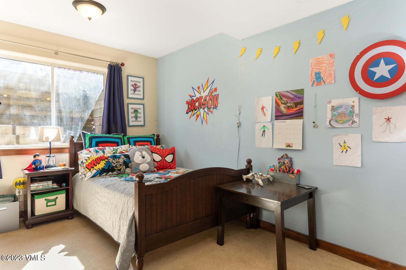 320 Golden Eagle Eagle, CO 81631 - Photo 15 of 26 a bedroom with a bed and a table in it