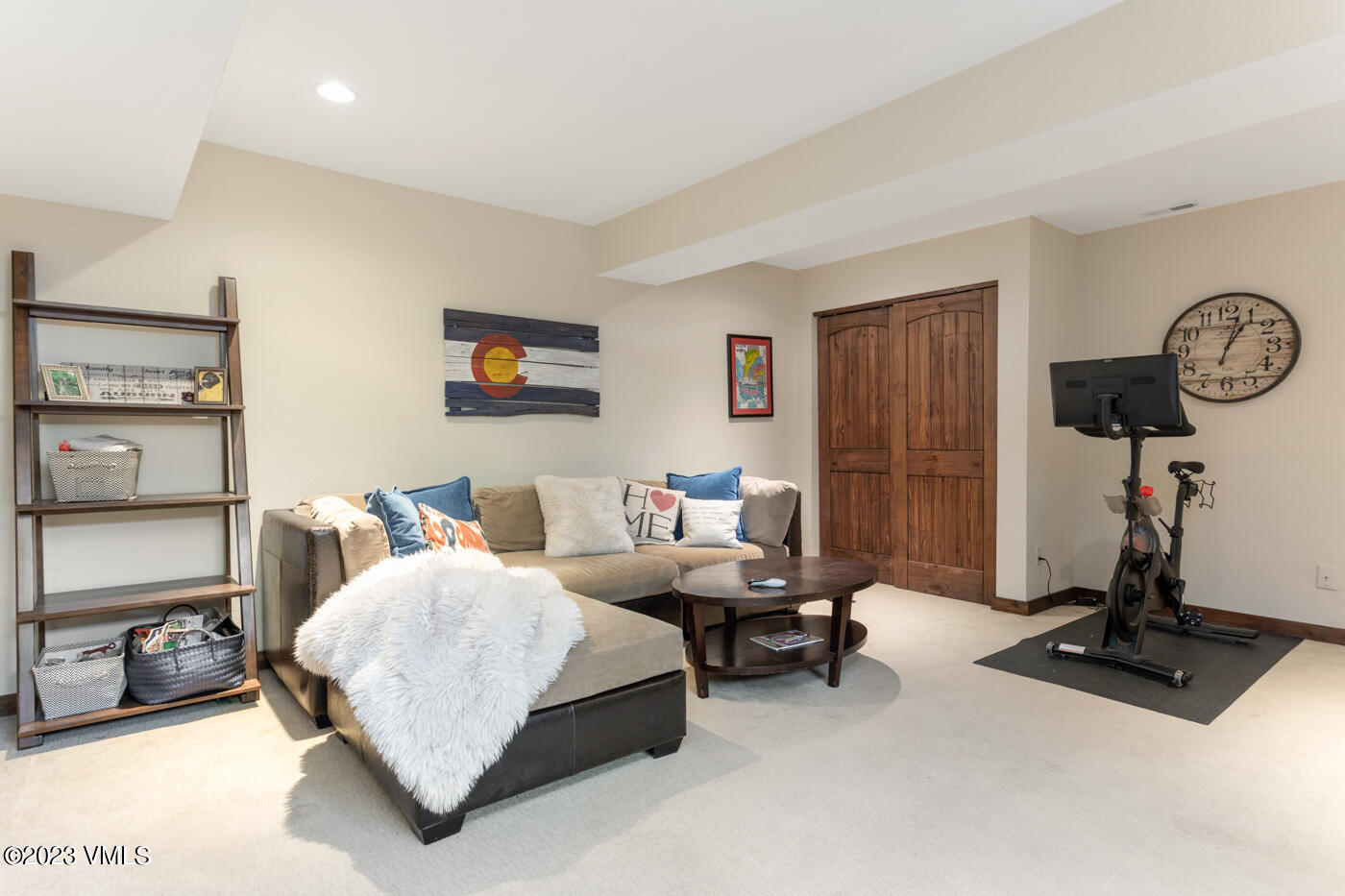 320 Golden Eagle Eagle, CO 81631 - Photo 18 of 26 a bedroom with bed and a chandelier