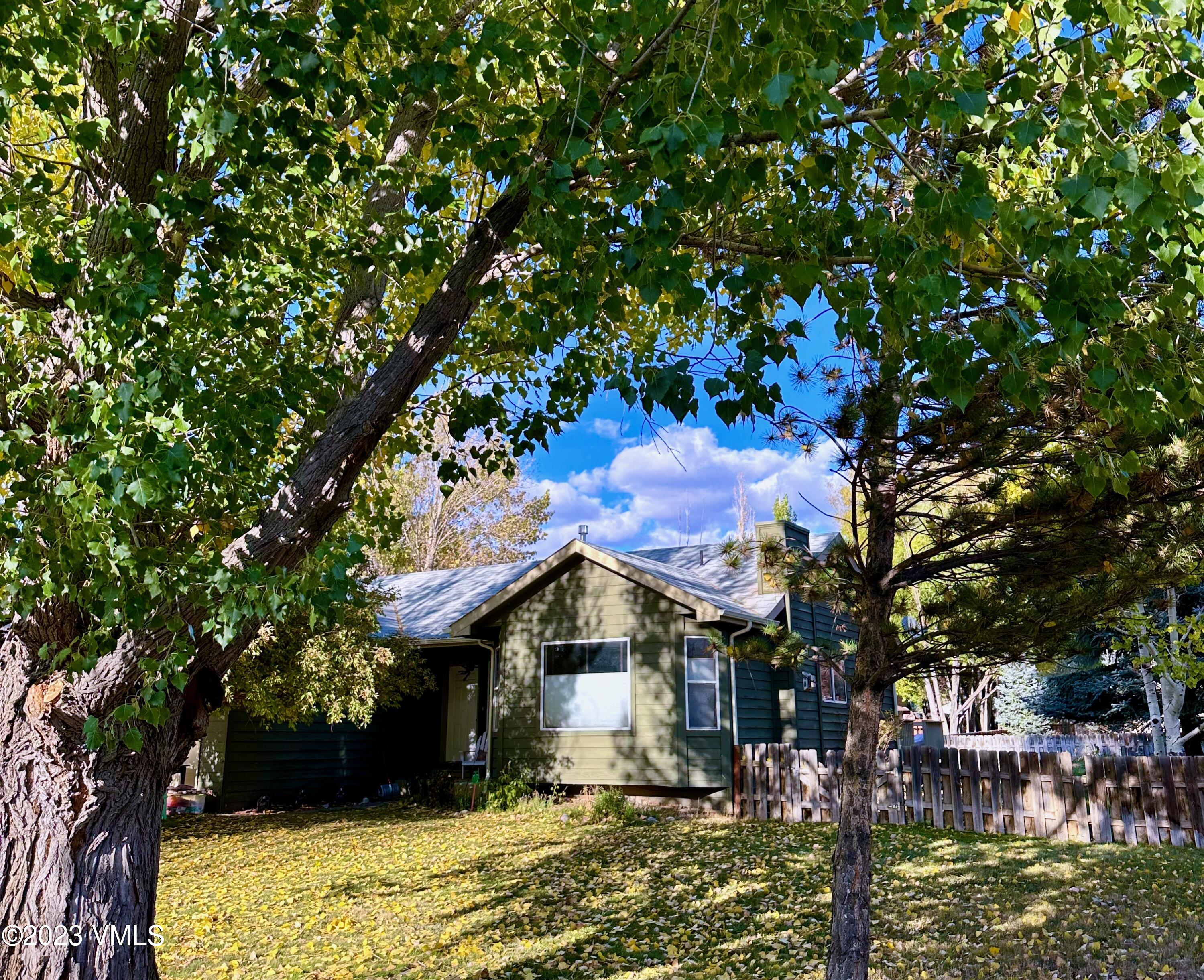 320 Golden Eagle Eagle, CO 81631 - Photo 2 of 26 a front view of a house with a yard