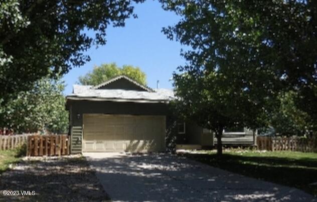 320 Golden Eagle Eagle, CO 81631 - Photo 23 of 26 a front view of a house with a garden