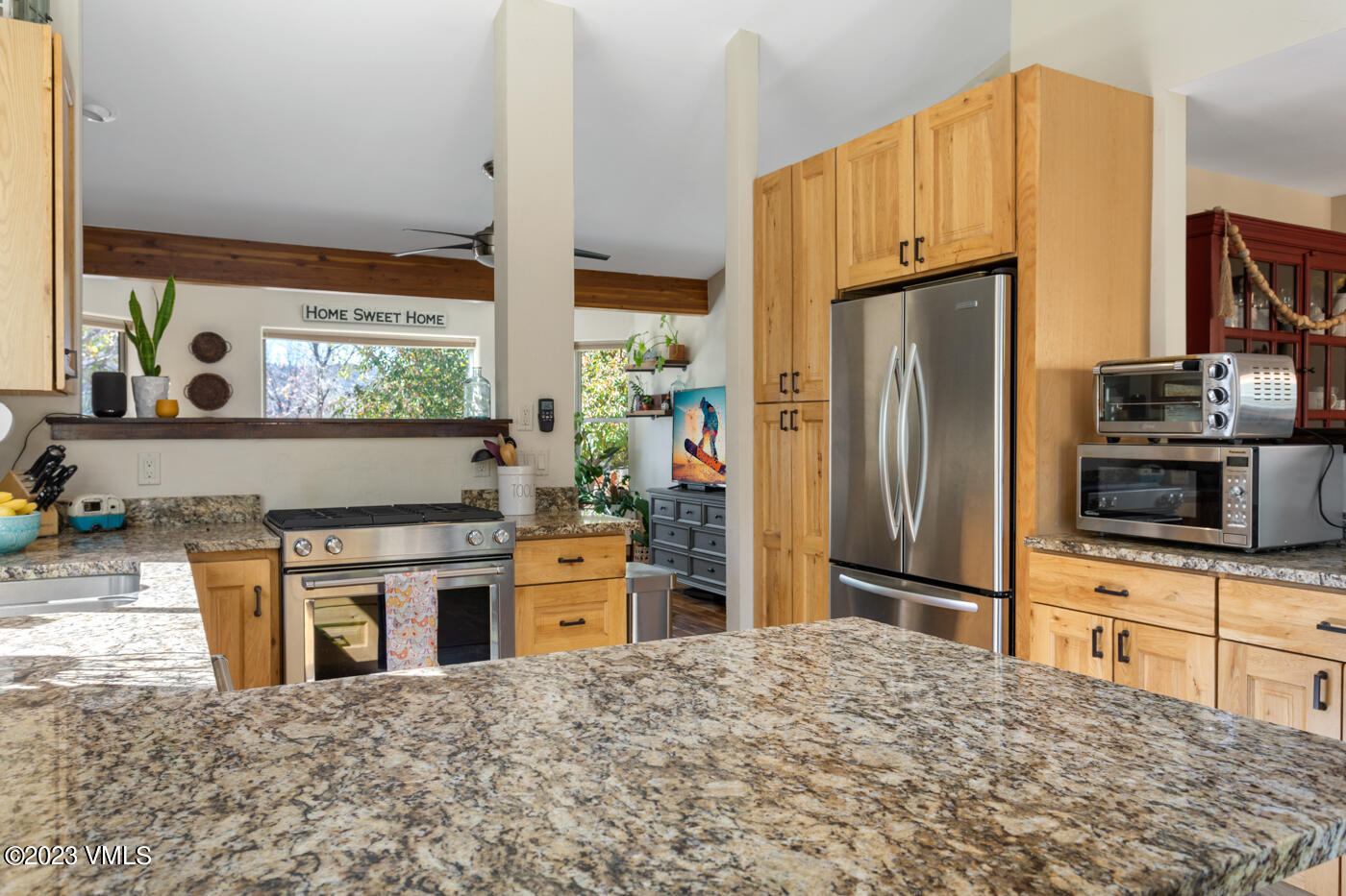 320 Golden Eagle Eagle, CO 81631 - Photo 9 of 26 a kitchen with stainless steel appliances a refrigerator sink and stove