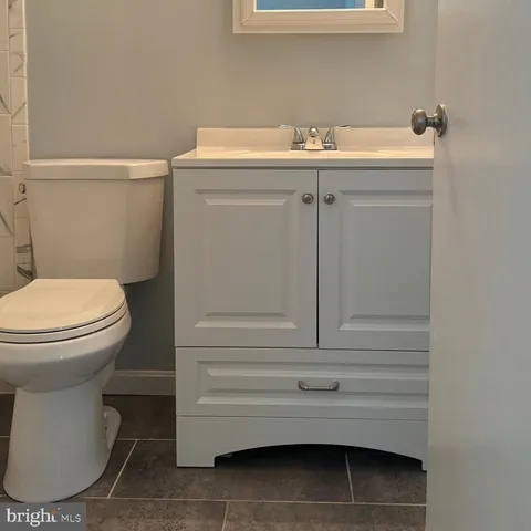 a bathroom with a sink and a toilet