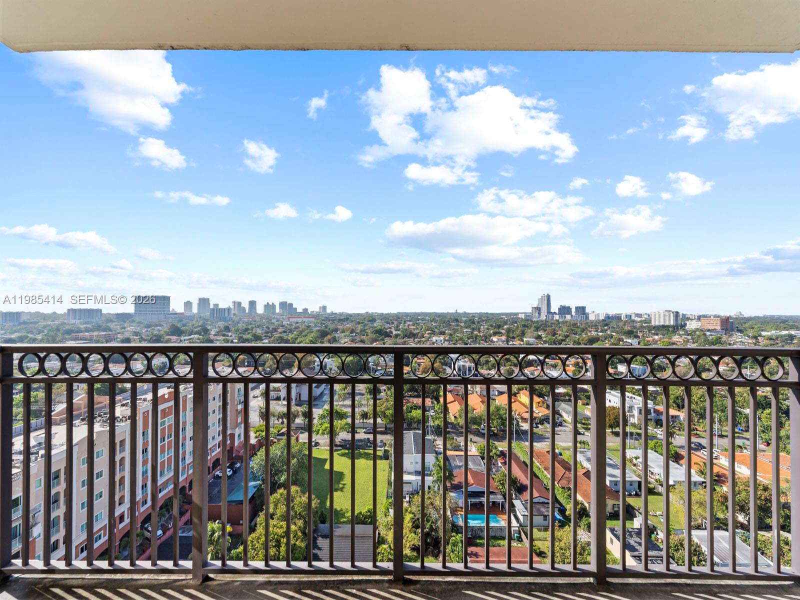 3232 Southwest 22nd Terrace, Unit 1609 Miami, FL 33145 - Photo 23 of 37 a view of city with a lake