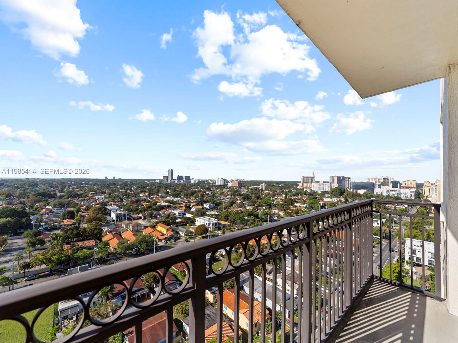3232 Southwest 22nd Terrace, Unit 1609 Miami, FL 33145 - Photo 26 of 37 a view of city from a balcony
