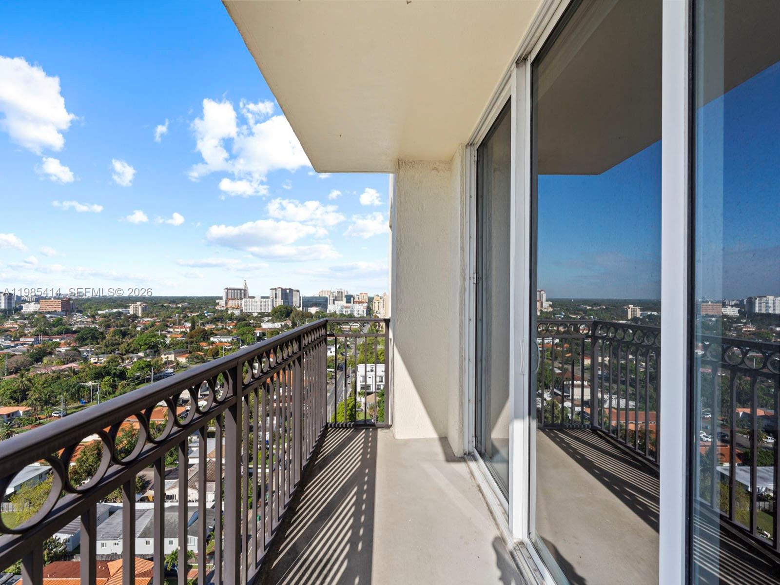 3232 Southwest 22nd Terrace, Unit 1609 Miami, FL 33145 - Photo 27 of 37 a view of a balcony with city view