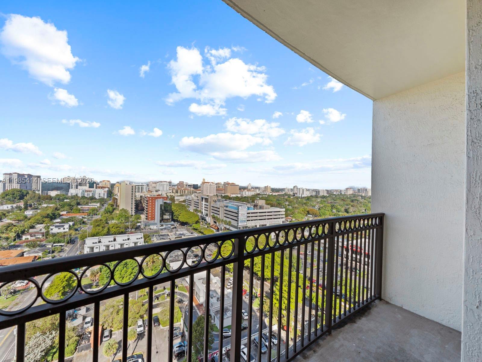 3232 Southwest 22nd Terrace, Unit 1609 Miami, FL 33145 - Photo 28 of 37 a view of city from a balcony