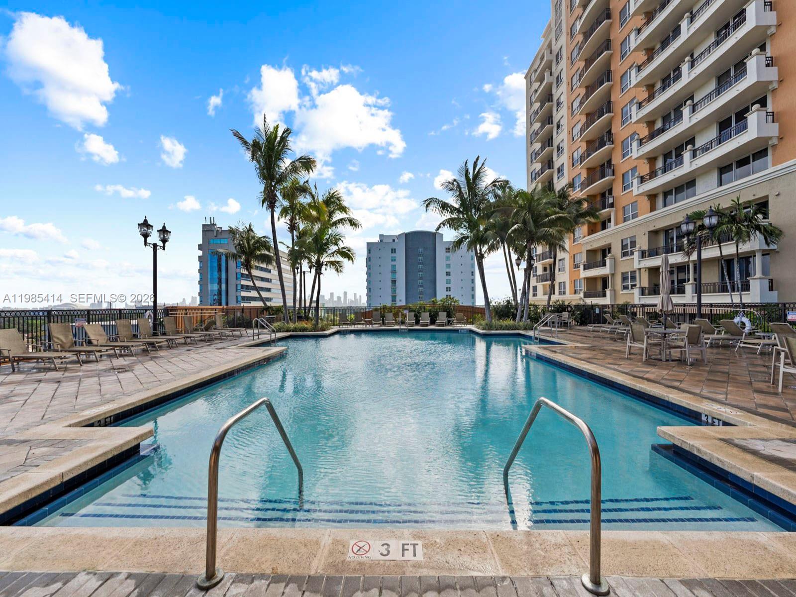 3232 Southwest 22nd Terrace, Unit 1609 Miami, FL 33145 - Photo 35 of 37 a view of swimming pool