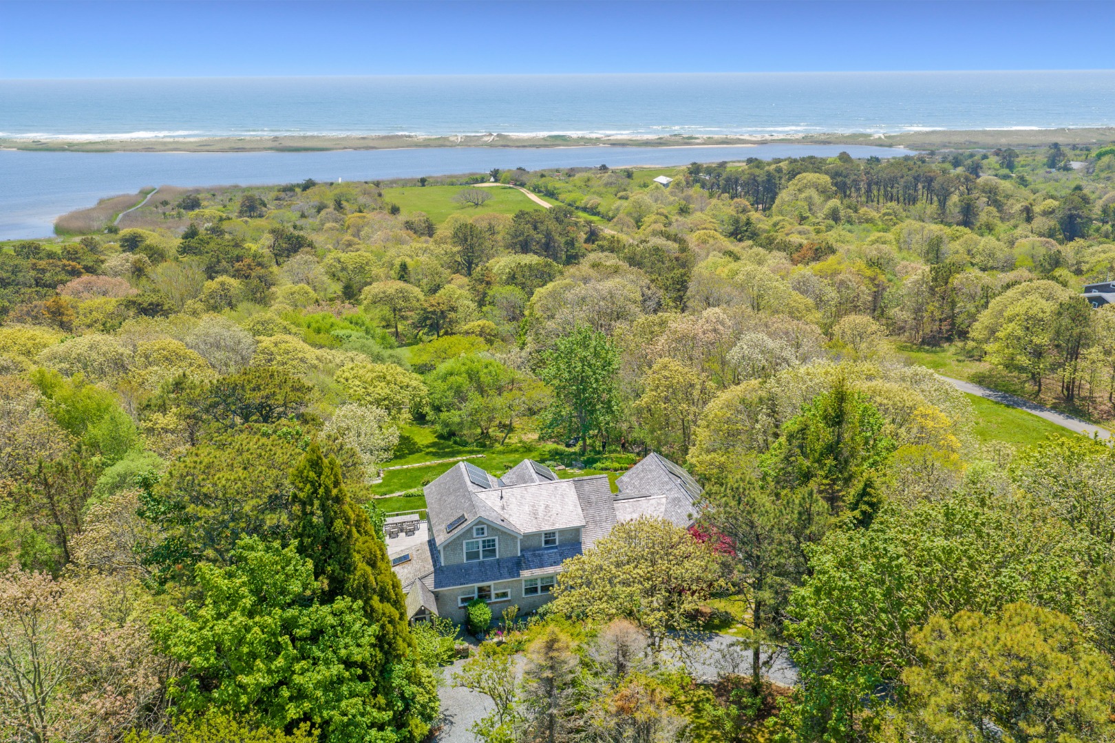 Waterfront four bedroom home with private beach and dock