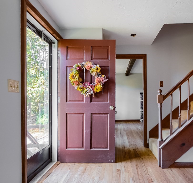 16 McIntyre Road Charlton, MA 01507 - Photo 4 of 26 a view of an entryway with wooden floor