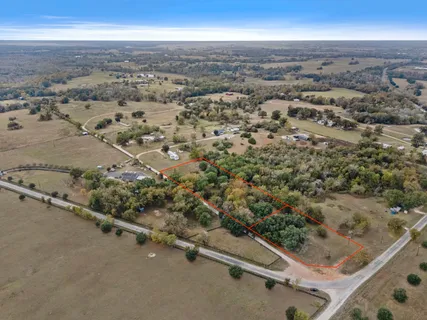a childrens park with lots of trees