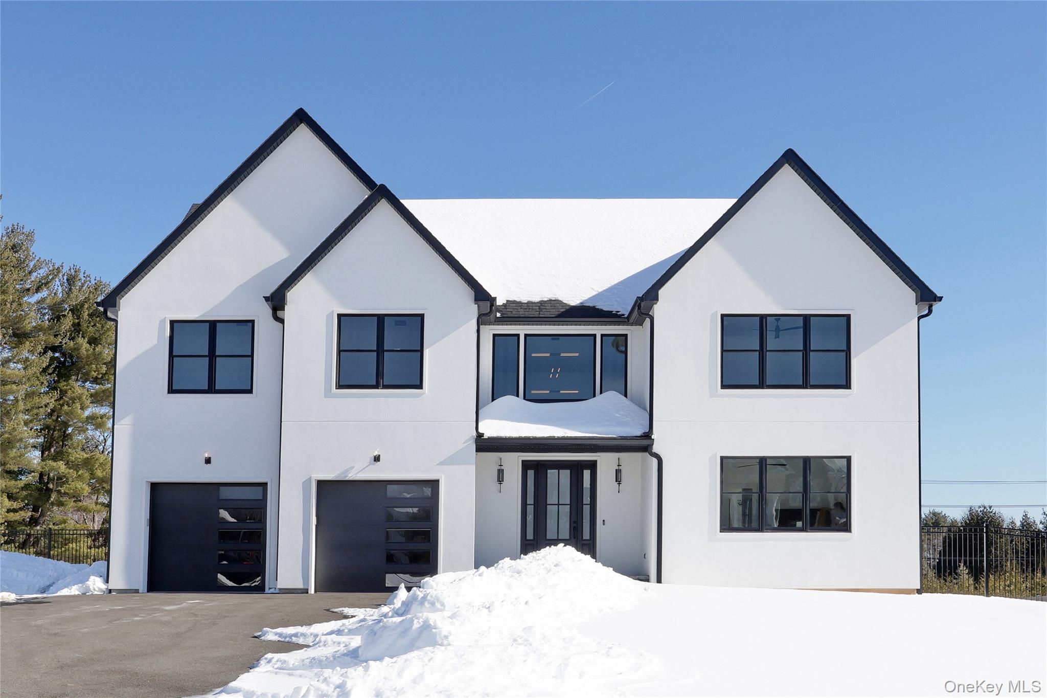 a view of a house with a bed and a fireplace