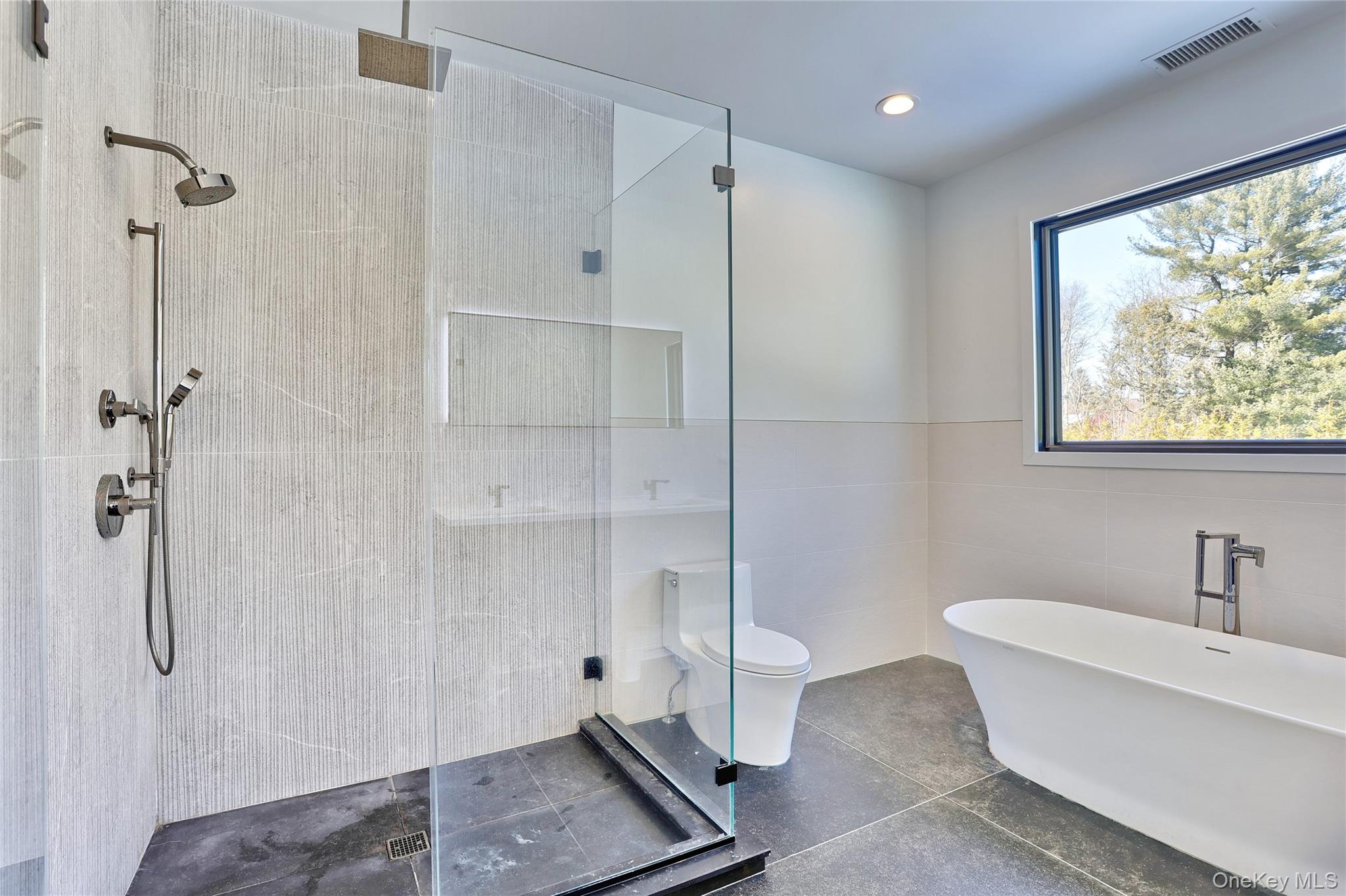 37 Harvest Road New City, NY 10956 - Photo 21 of 33 a bathroom with a bathtub and shower