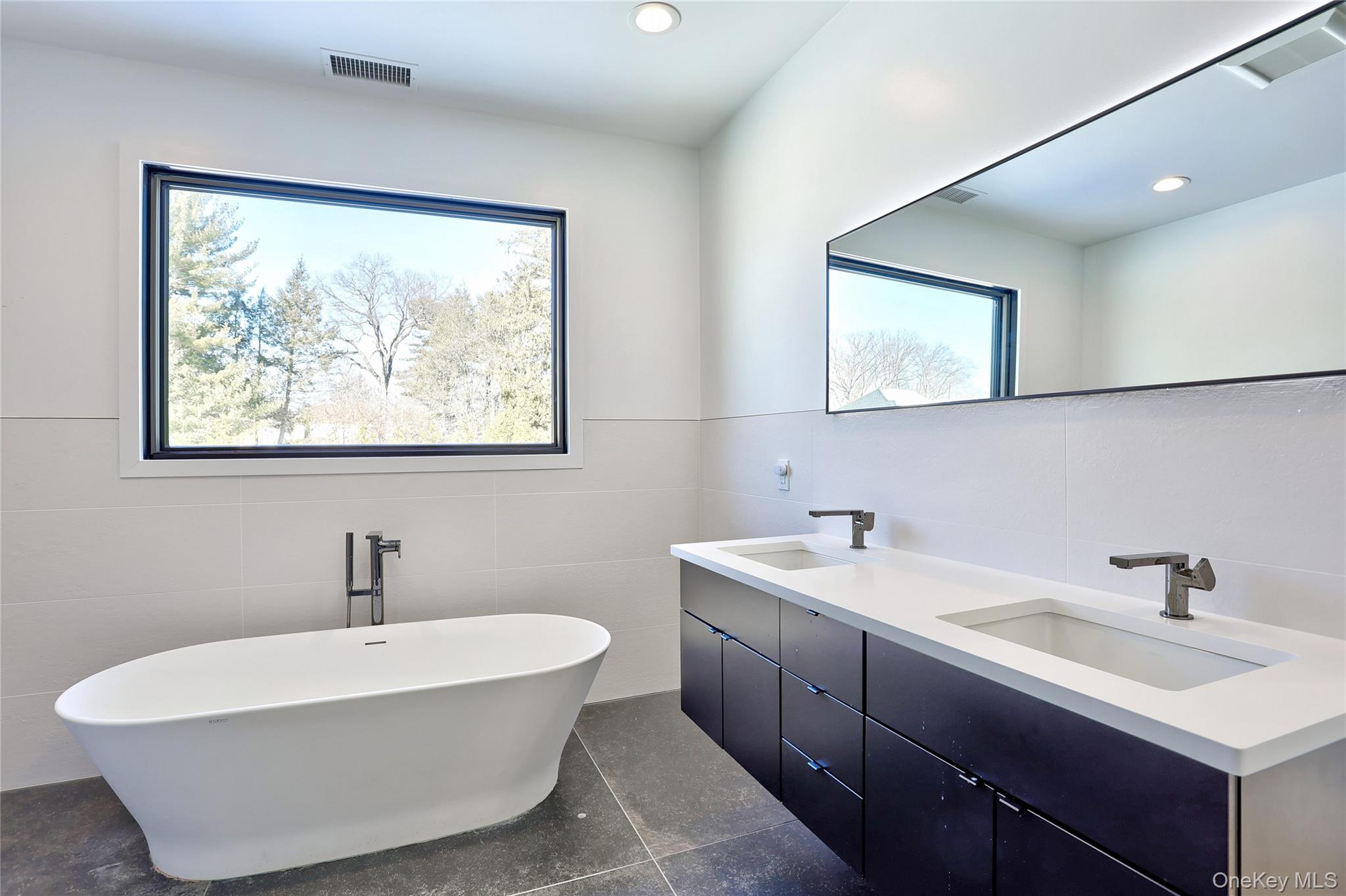 37 Harvest Road New City, NY 10956 - Photo 22 of 33 a bathroom with a sink and a mirror