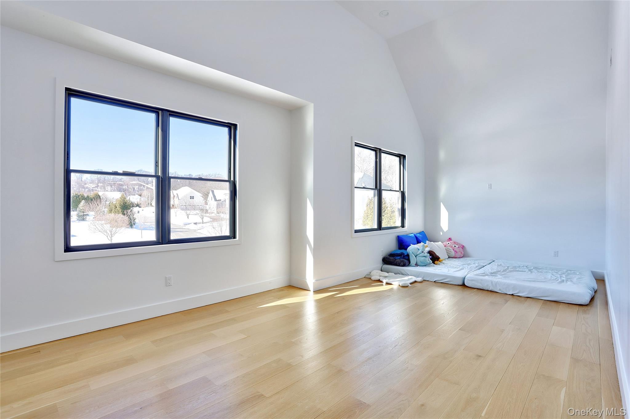 37 Harvest Road New City, NY 10956 - Photo 23 of 33 an empty room with wooden floor and windows