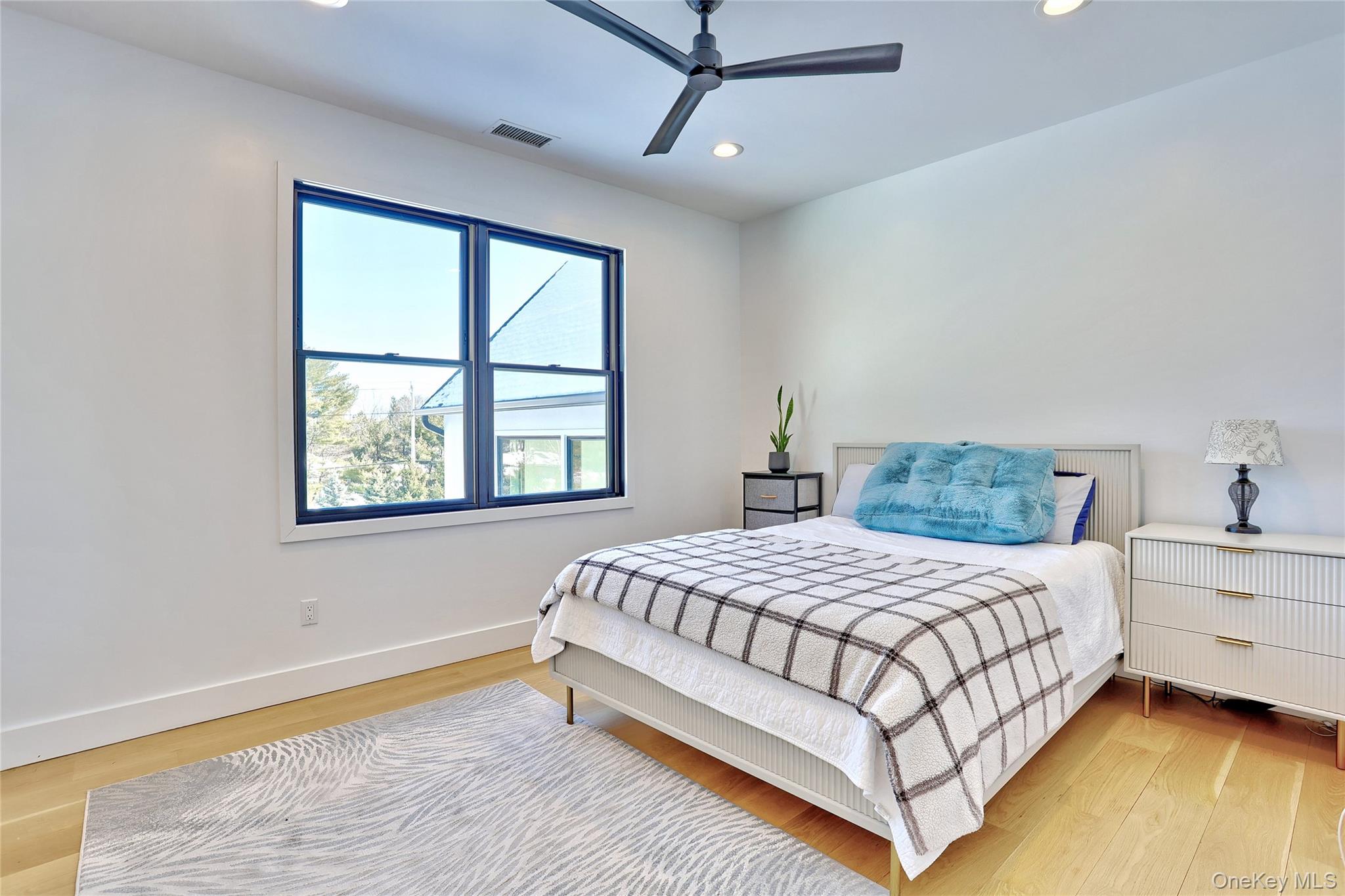 37 Harvest Road New City, NY 10956 - Photo 26 of 35 a bedroom with a large bed and a window