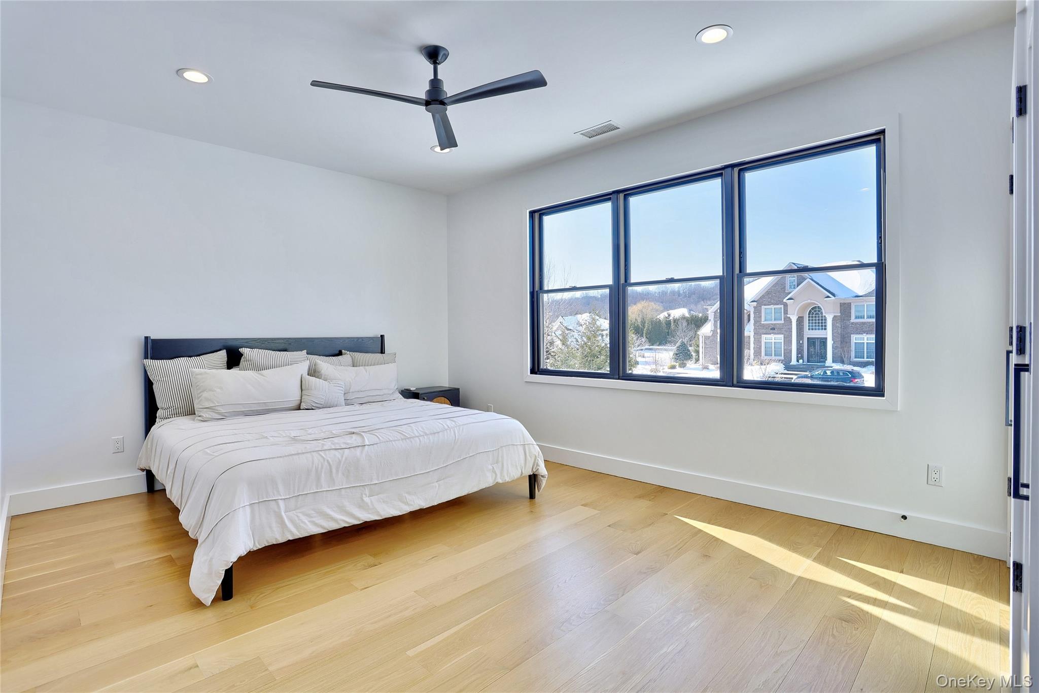 37 Harvest Road New City, NY 10956 - Photo 27 of 33 a bedroom with a large bed and a window