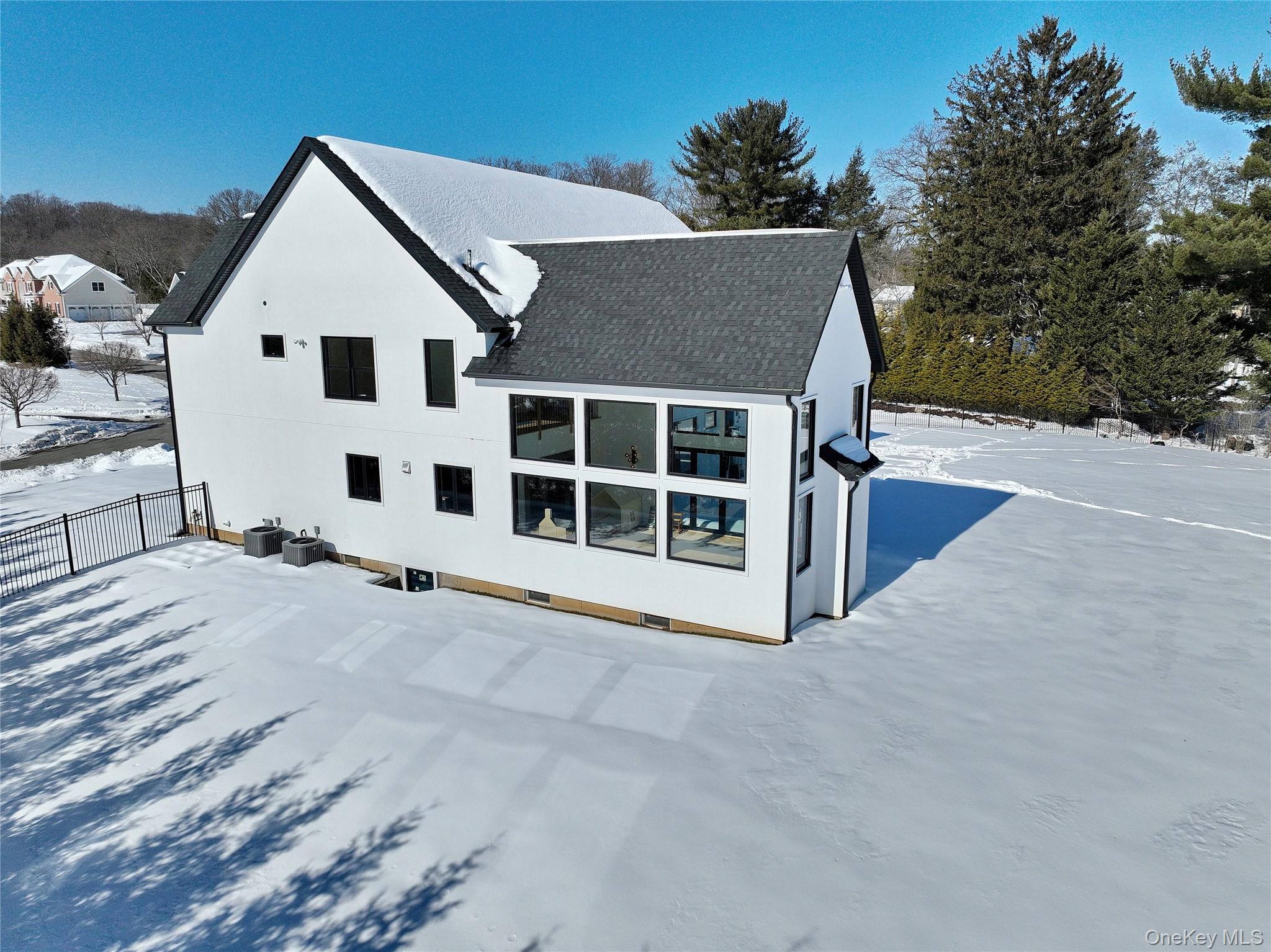 37 Harvest Road New City, NY 10956 - Photo 32 of 35 a view of a white house with a yard