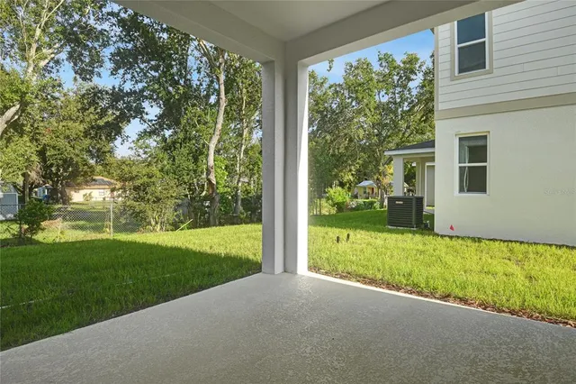 a view of a porch with a yard