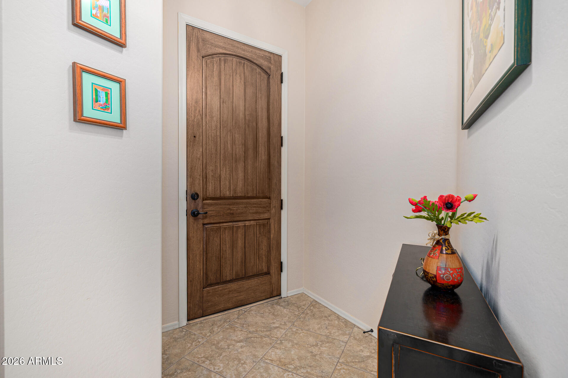 6202 East McKellips Road, Unit 297 Mesa, AZ 85215 - Photo 10 of 57 a view of a hallway with a flower pot