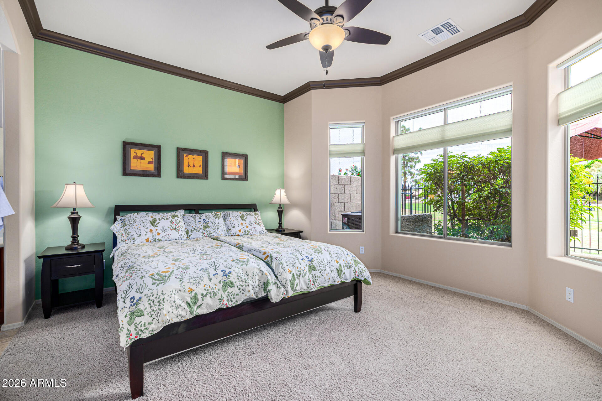 6202 East McKellips Road, Unit 297 Mesa, AZ 85215 - Photo 27 of 57 a bedroom with a bed and window