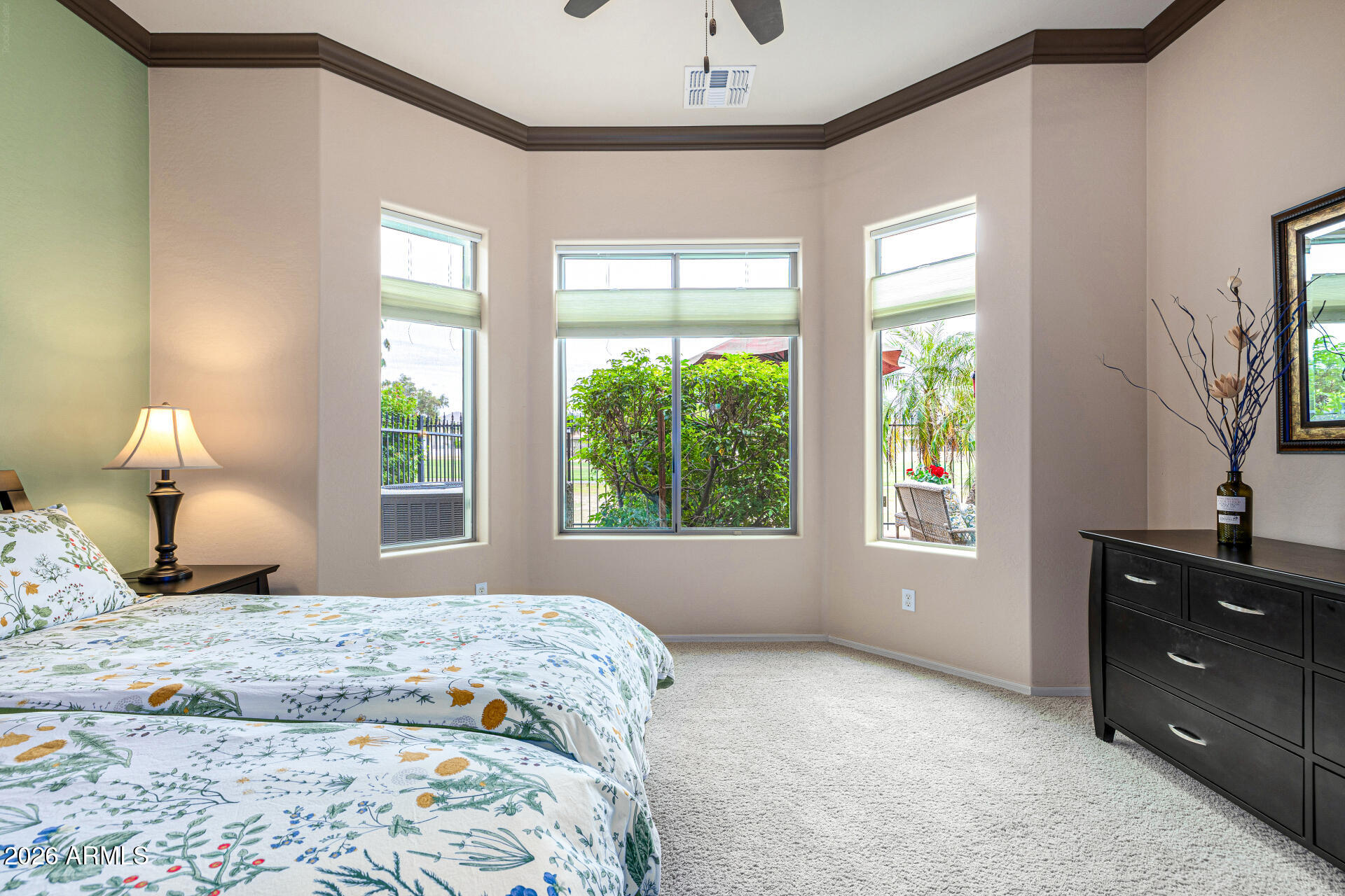 6202 East McKellips Road, Unit 297 Mesa, AZ 85215 - Photo 29 of 57 a bedroom with a bed and a window