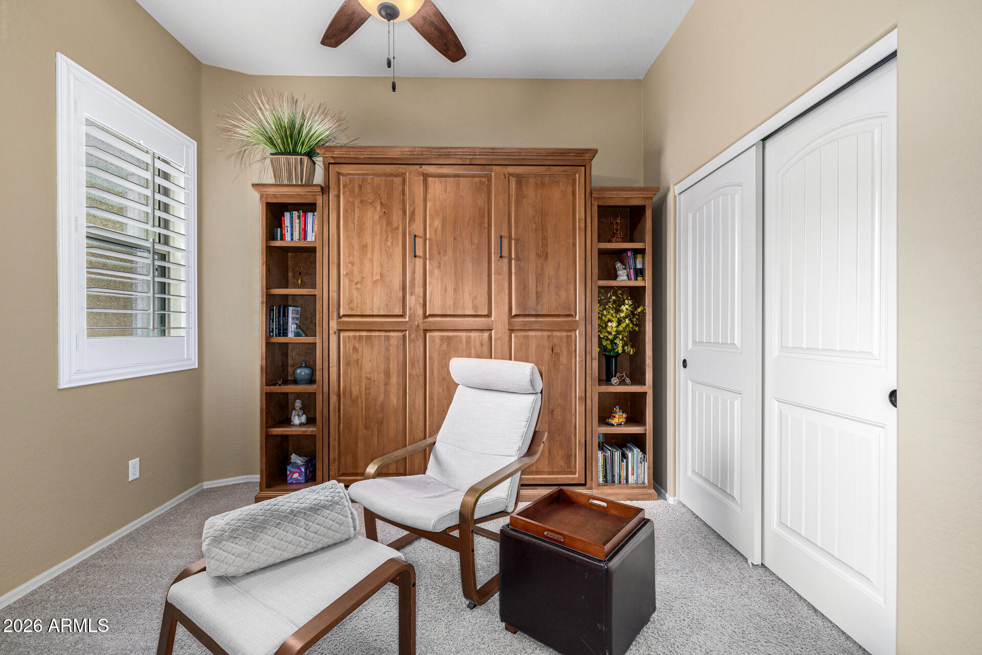 6202 East McKellips Road, Unit 297 Mesa, AZ 85215 - Photo 33 of 57 a room with furniture and a window