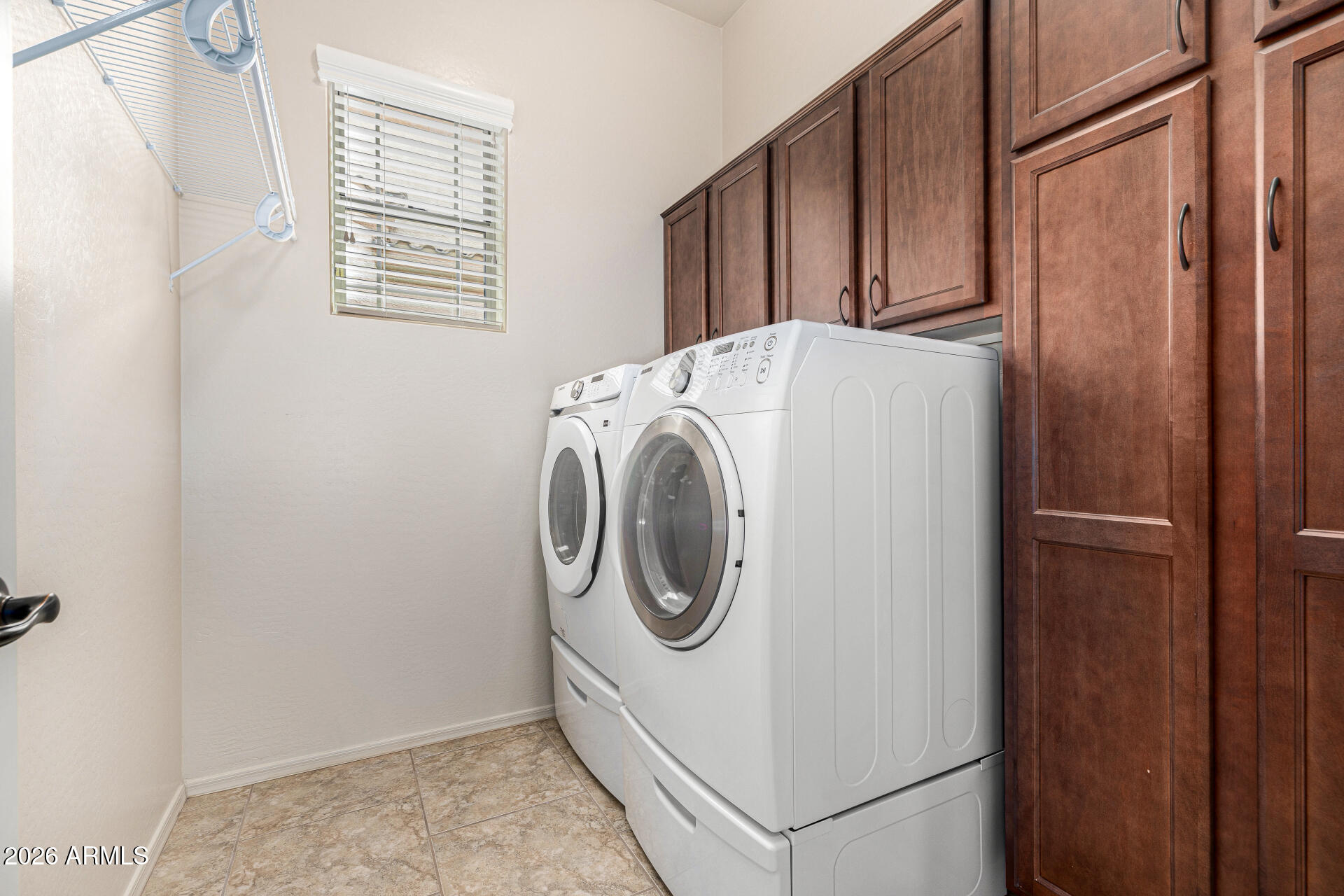 6202 East McKellips Road, Unit 297 Mesa, AZ 85215 - Photo 38 of 57 a utility room with dryer and washer