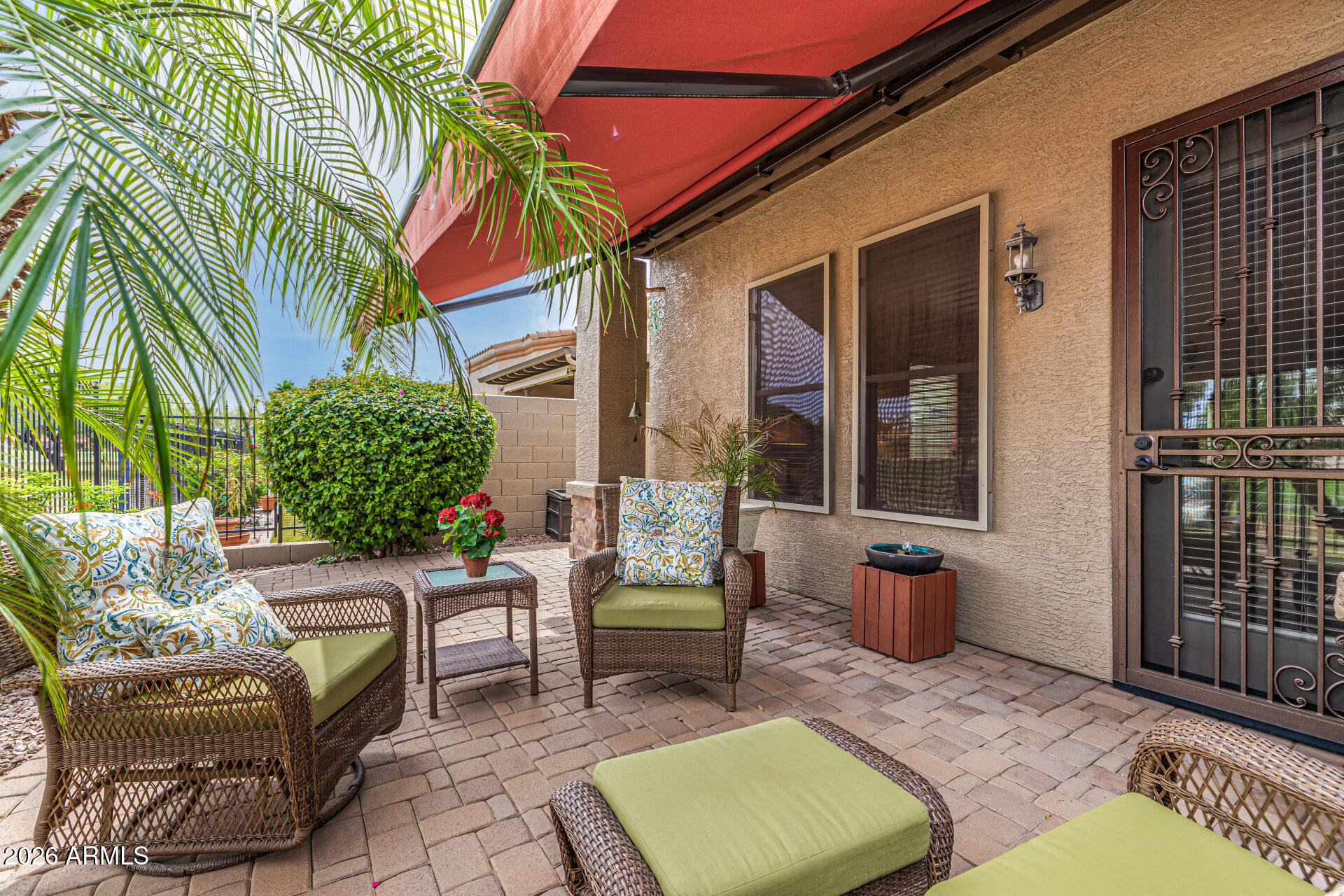 6202 East McKellips Road, Unit 297 Mesa, AZ 85215 - Photo 41 of 57 a backyard of a house with seating space
