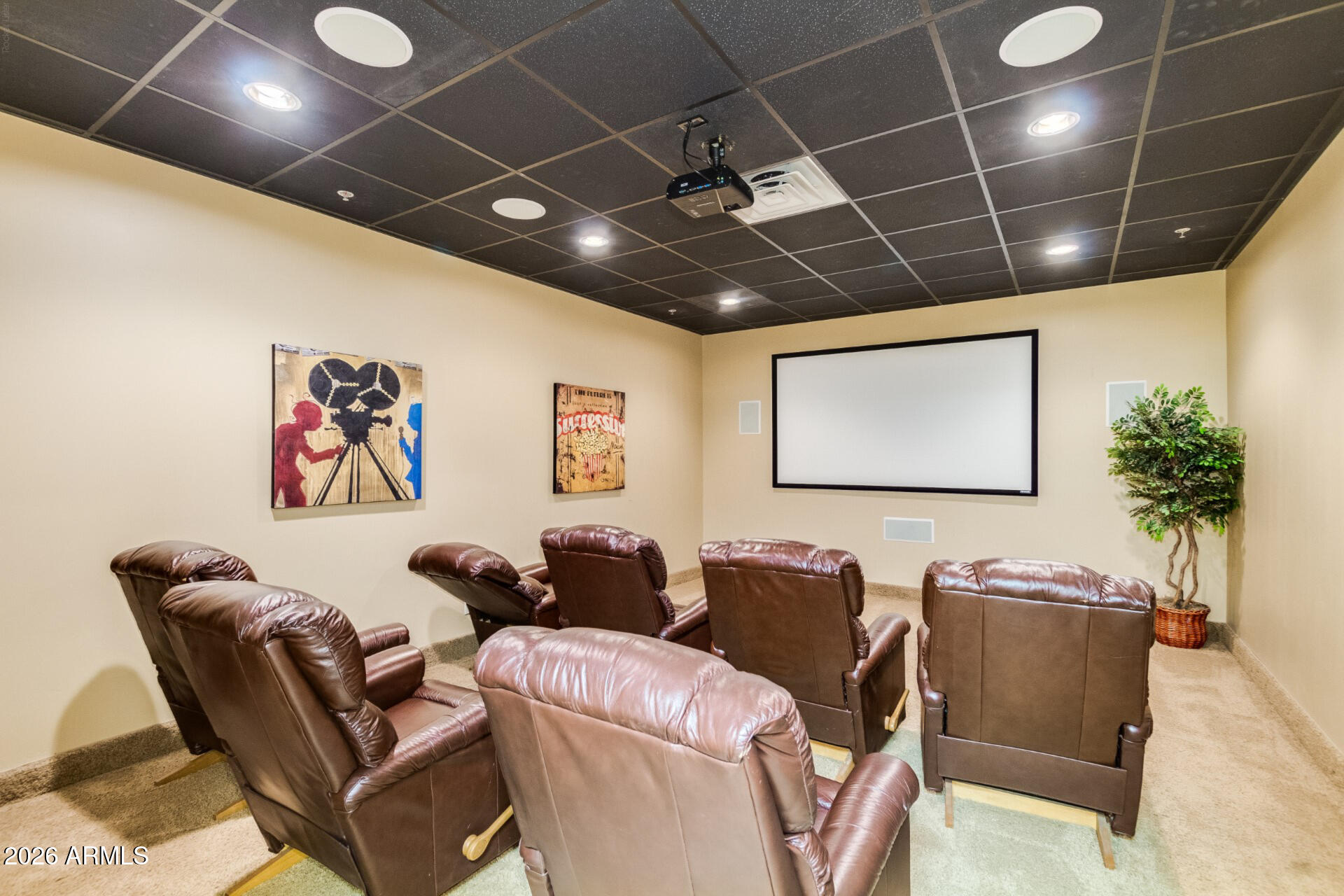 6202 East McKellips Road, Unit 297 Mesa, AZ 85215 - Photo 51 of 57 a media room with lots of furniture and screen