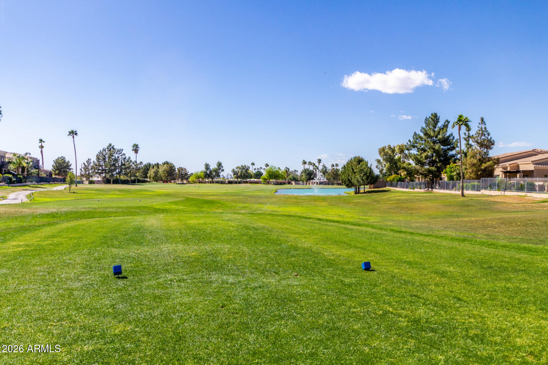 6202 East McKellips Road, Unit 297 Mesa, AZ 85215 - Photo 52 of 57 a view of a golf course with an trees