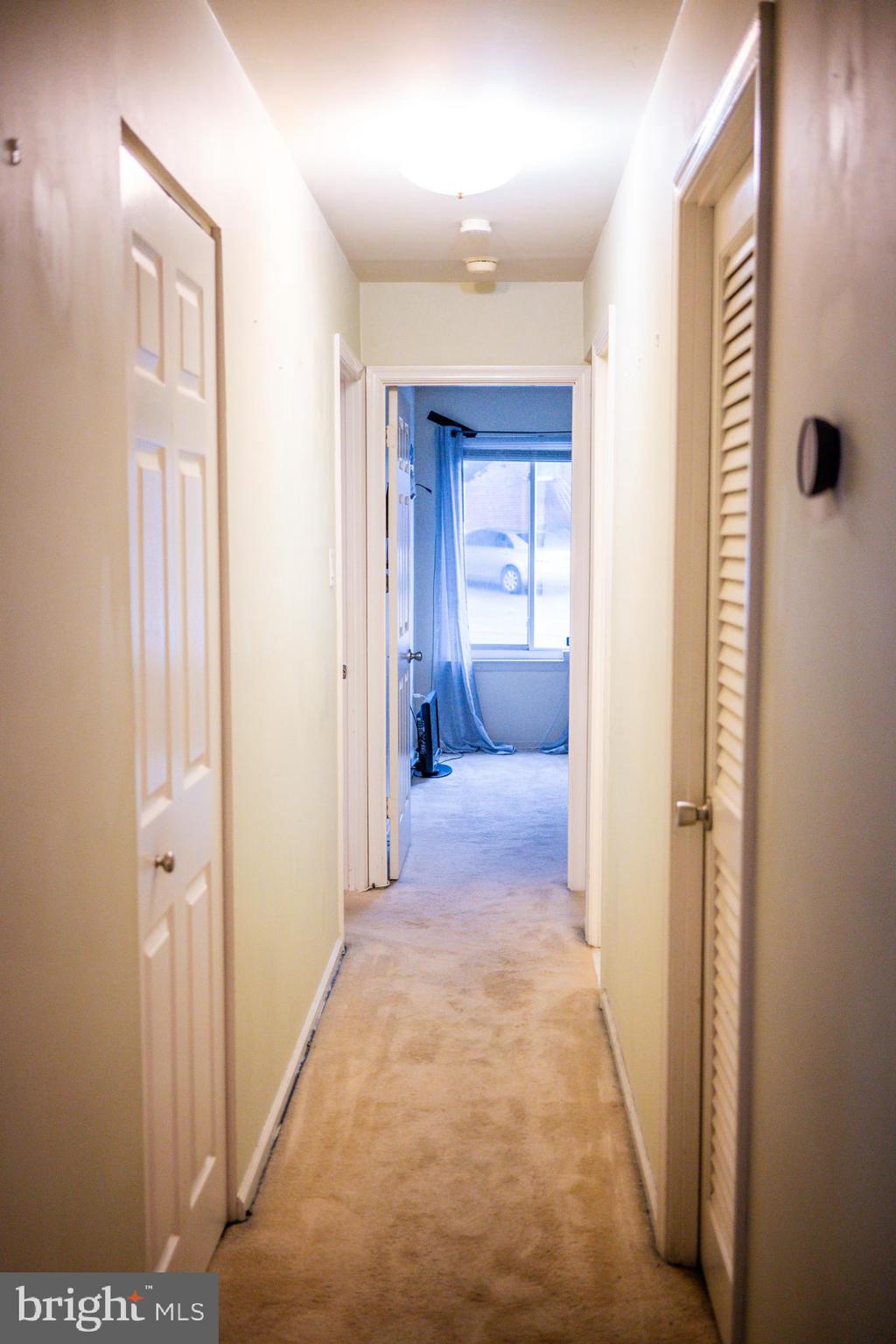 2089 Welsh Road, Unit F1 Philadelphia, PA 19115 - Photo 12 of 27 a view of a bedroom from a hallway