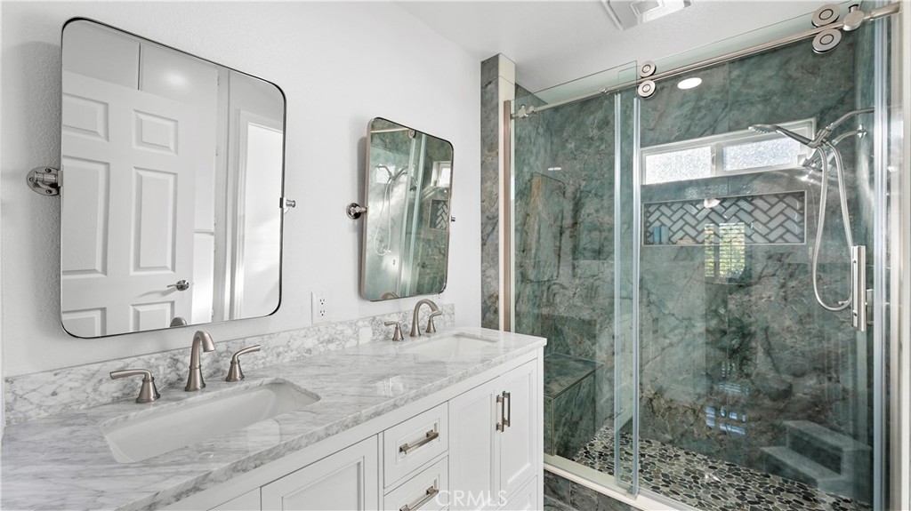 2785 State Street Corona, CA 92881 - Photo 43 of 74 Spacious bathroom with double vanity and walk-in shower
