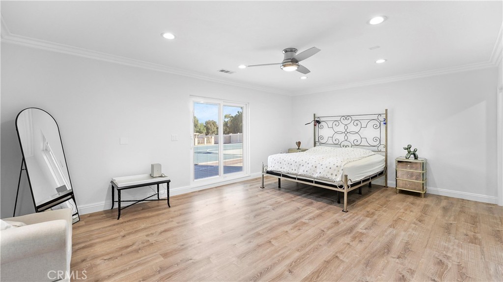 2785 State Street Corona, CA 92881 - Photo 44 of 74 Spacious primary bedroom with direct outdoor access