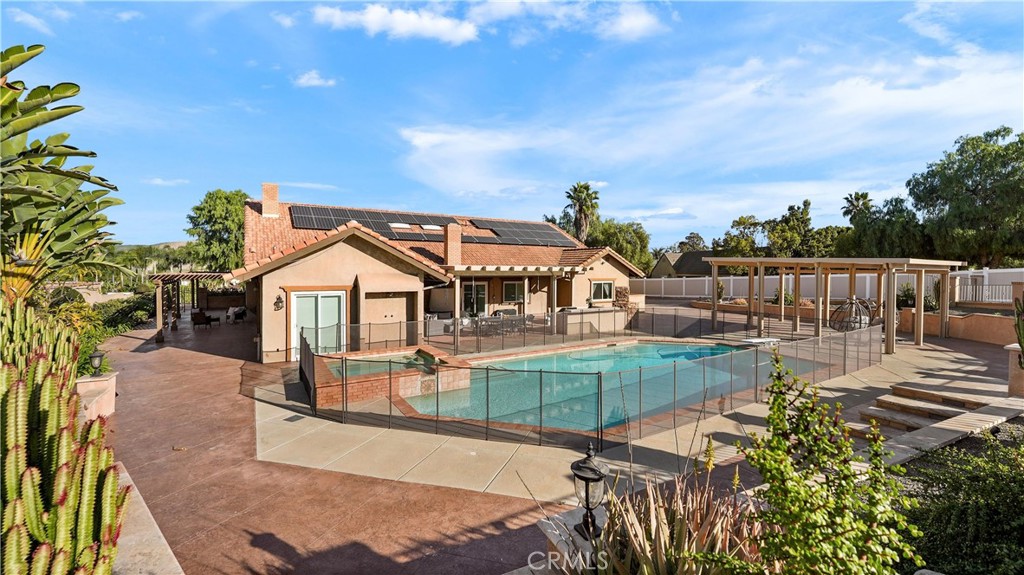 2785 State Street Corona, CA 92881 - Photo 58 of 74 Beautiful pool and spa with safety fencing