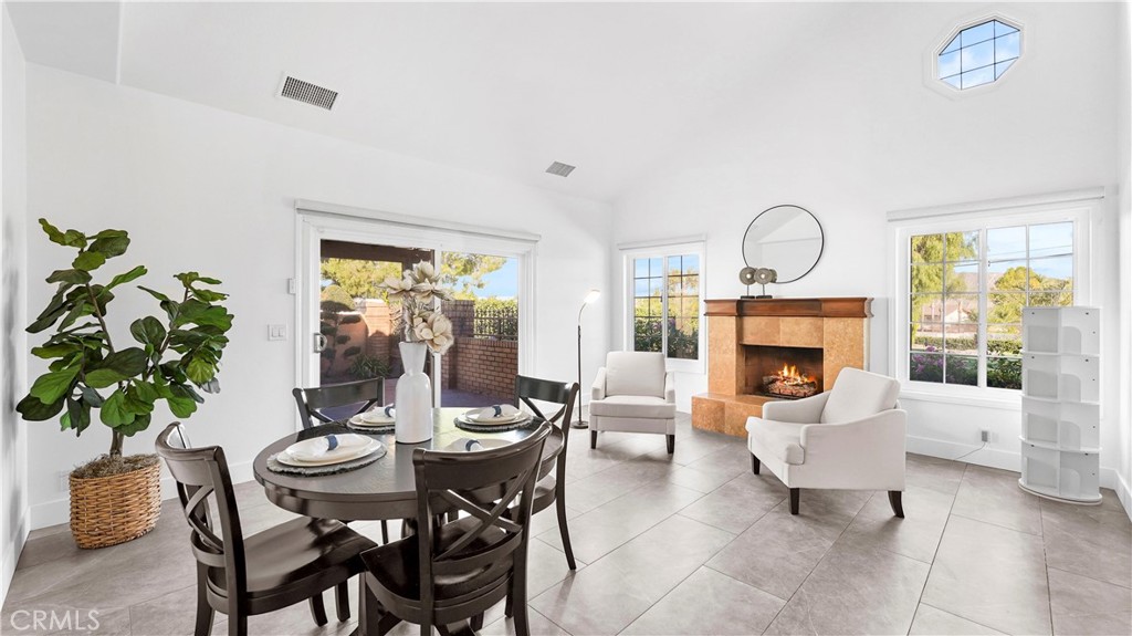 2785 State Street Corona, CA 92881 - Photo 9 of 74 Open dining area with fireplace