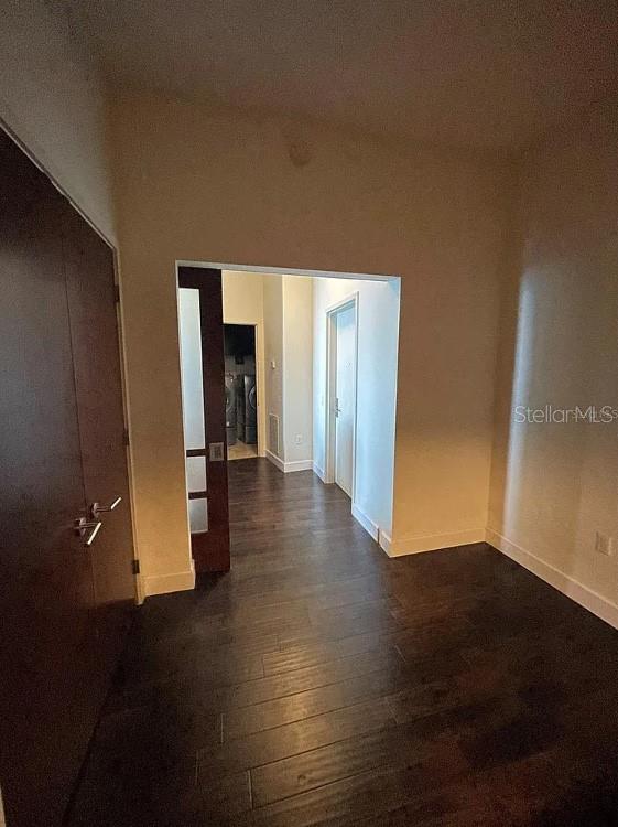 912 Channelside Drive, Unit 2803 Tampa, FL 33602 - Photo 11 of 34 an empty room with wooden floor and closet