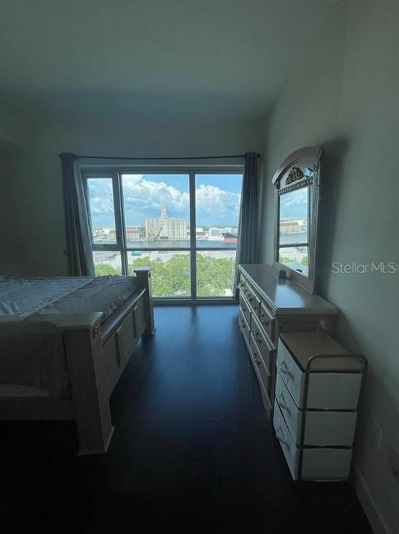 912 Channelside Drive, Unit 2803 Tampa, FL 33602 - Photo 14 of 34 wooden floor in an empty room with a window