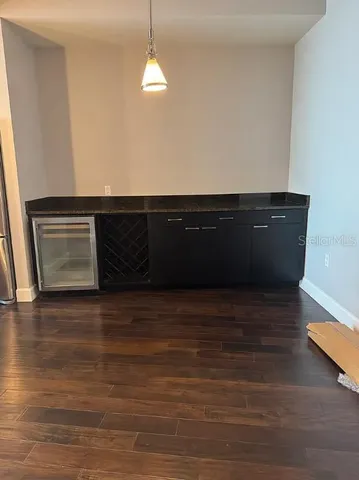 a bathroom with a shower and a bath tub