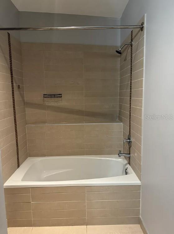 912 Channelside Drive, Unit 2803 Tampa, FL 33602 - Photo 22 of 34 a bathroom with a shower and a bath tub
