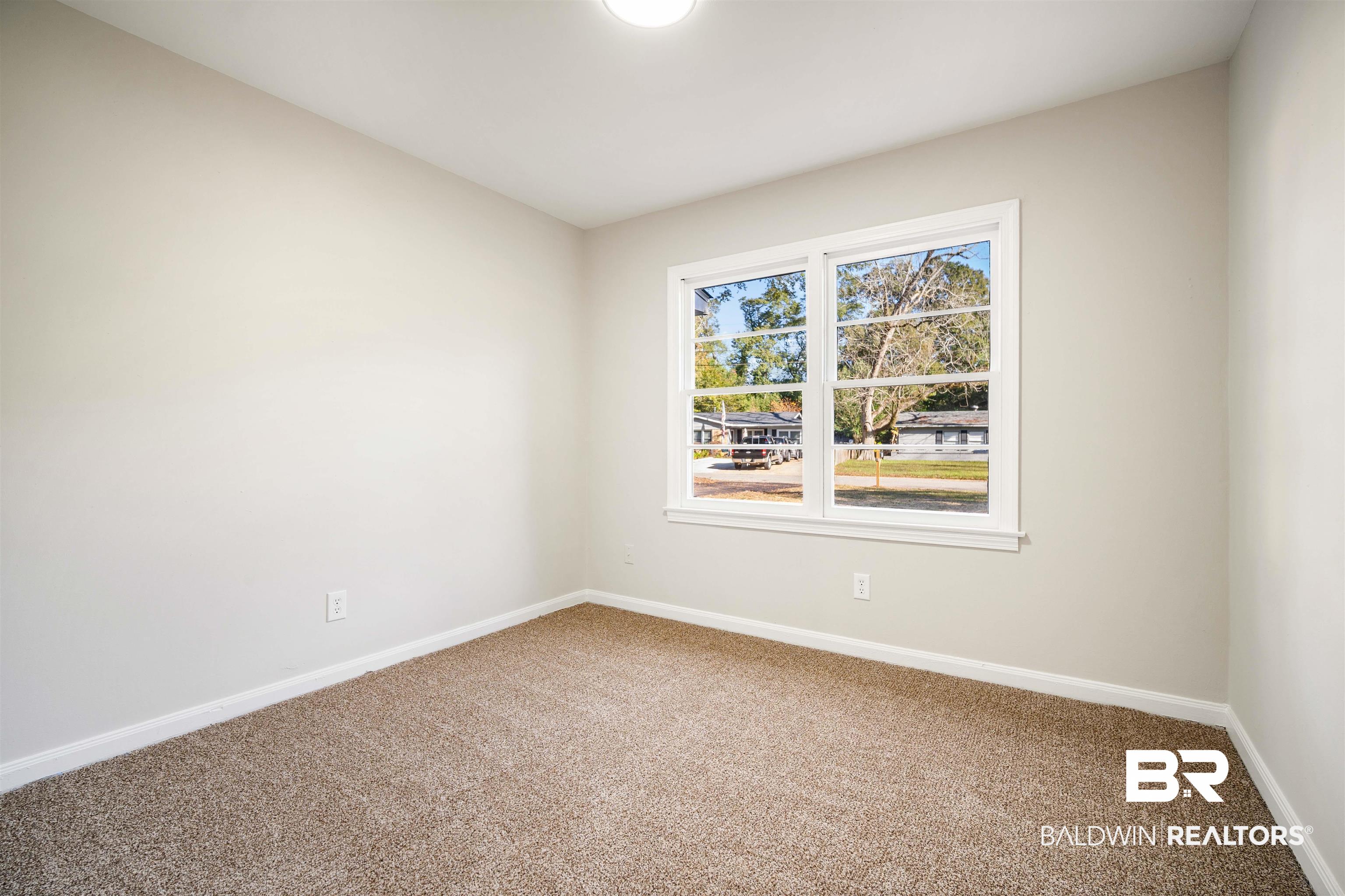 662 Merritt Drive Mobile, AL 36609 - Photo 16 of 21 View of carpeted spare room
