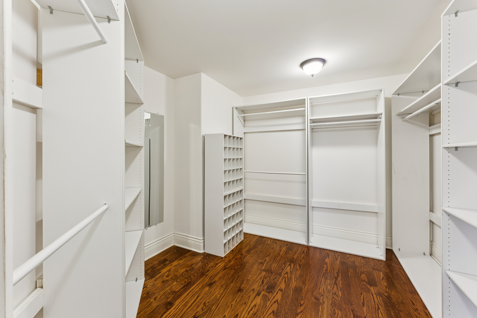 1407 Rue Paris Place Inverness, IL 60067 - Photo 18 of 38 a view of walk in closet with empty racks