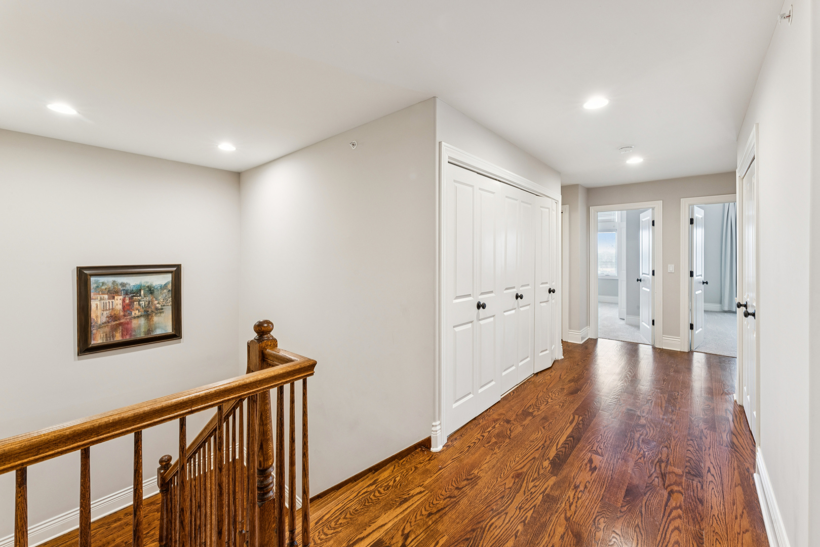 1407 Rue Paris Place Inverness, IL 60067 - Photo 19 of 38 a view of a hallway with wooden floor