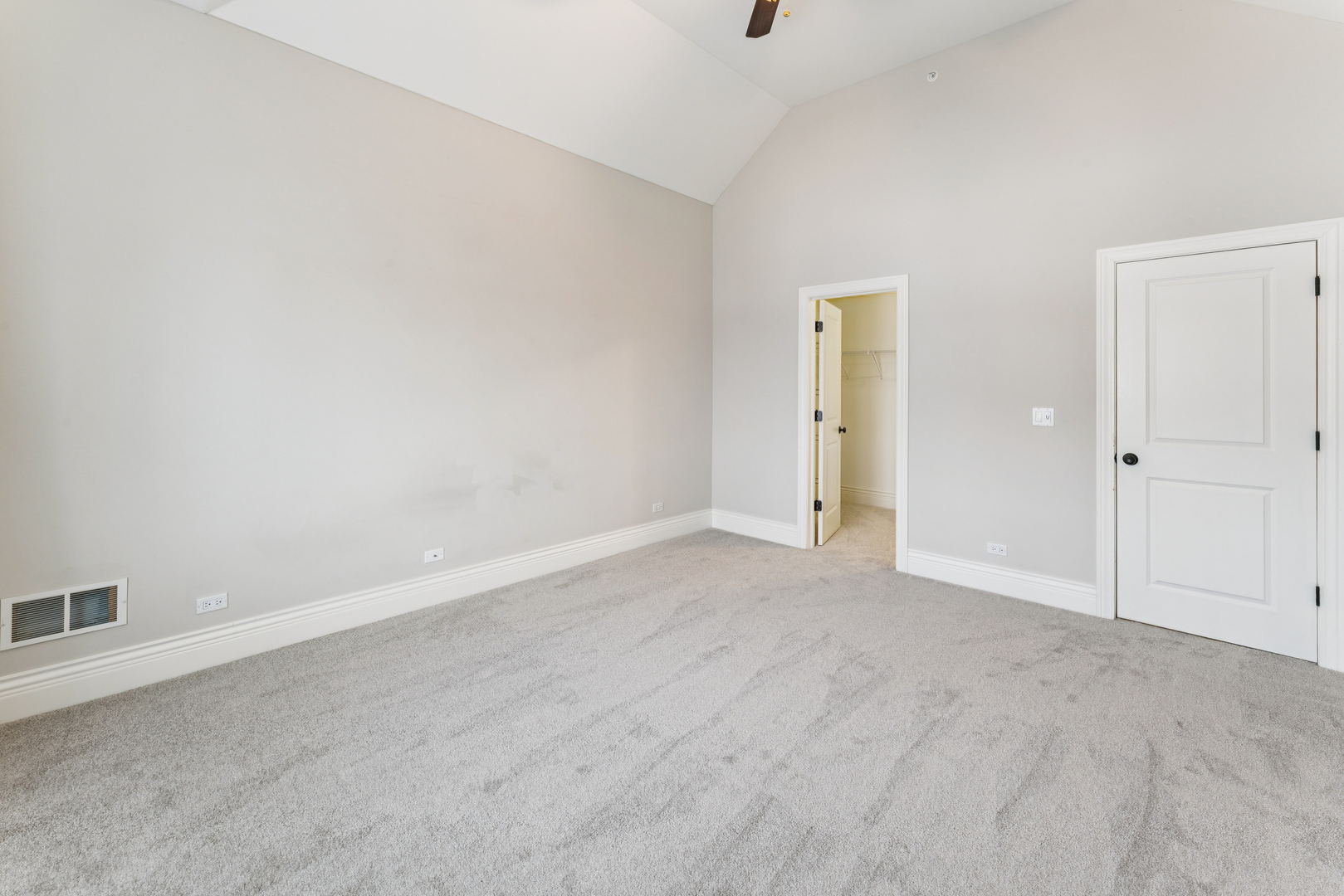 1407 Rue Paris Place Inverness, IL 60067 - Photo 21 of 38 an empty room with an entryway