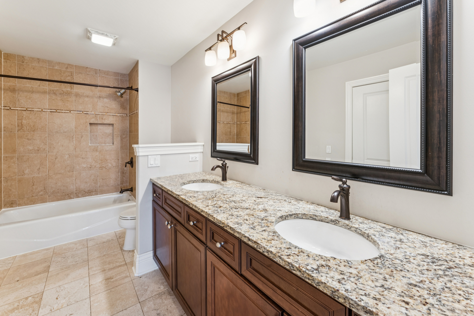 1407 Rue Paris Place Inverness, IL 60067 - Photo 22 of 38 a bathroom with a granite countertop double vanity sink and mirror