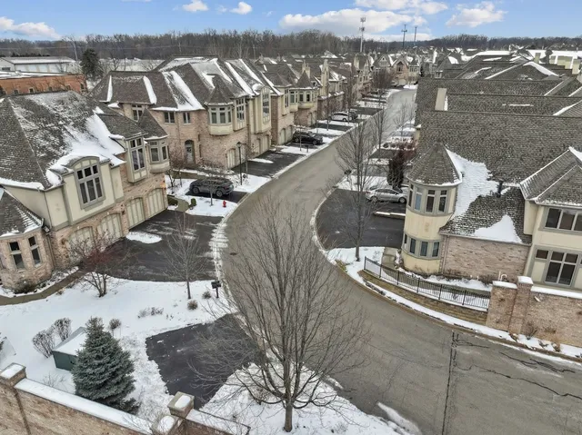 an aerial view of a residential building