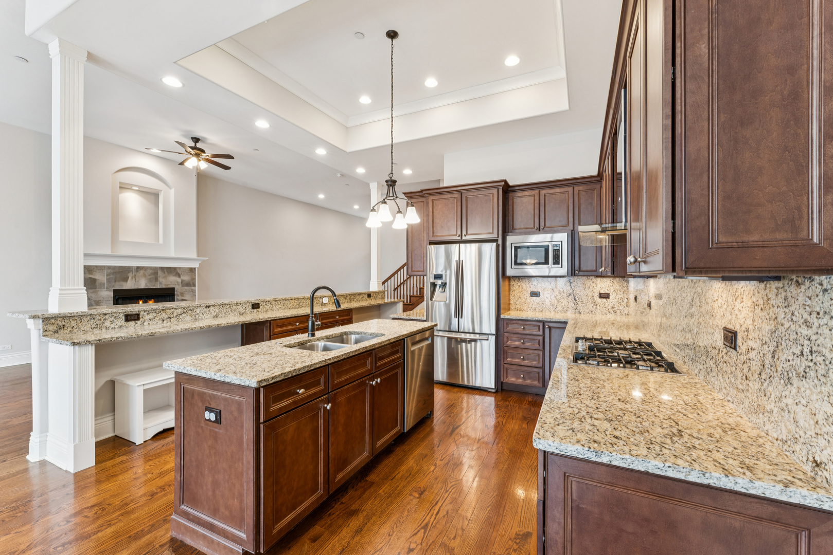 1407 Rue Paris Place Inverness, IL 60067 - Photo 9 of 38 a kitchen with stainless steel appliances granite countertop a sink stove and refrigerator