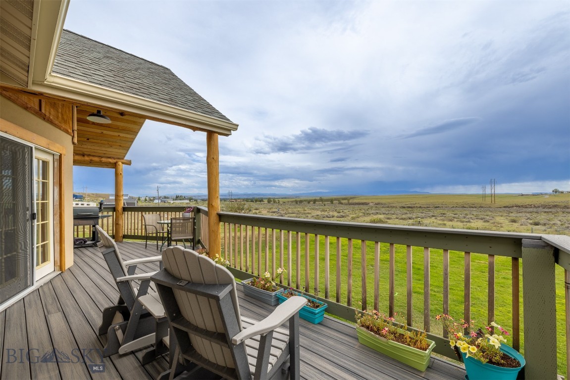 2899 Old Town Road Three Forks, MT 59752 - Photo 14 of 46 A large deck off the main floor lets you take in the beautiful views.
