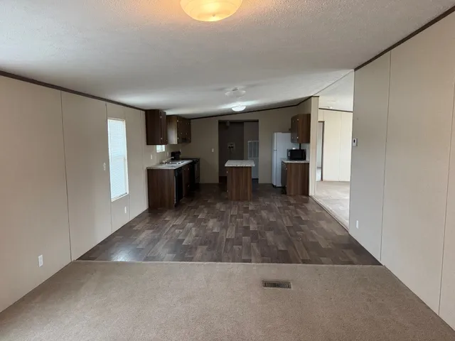 a view of a storage & utility room with a sink