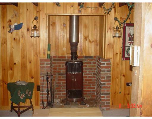 1019 Spurline Road Carrabassett Valley, ME 04947 - Photo 5 of 16 Living Room. Wood Stove