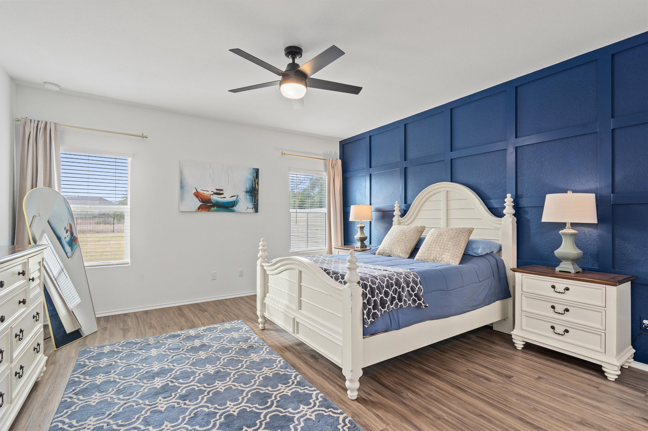 424 Wolf Springs Road Georgetown, TX 78628 - Photo 14 of 35 a bed room with a bed and a window